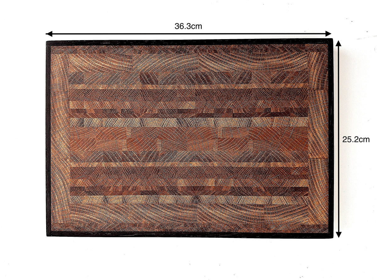 A rectangular wooden cutting board with a dark border and a striped wood-grain pattern, shown with dimension arrows and labels indicating 36.3cm by 25.2cm.